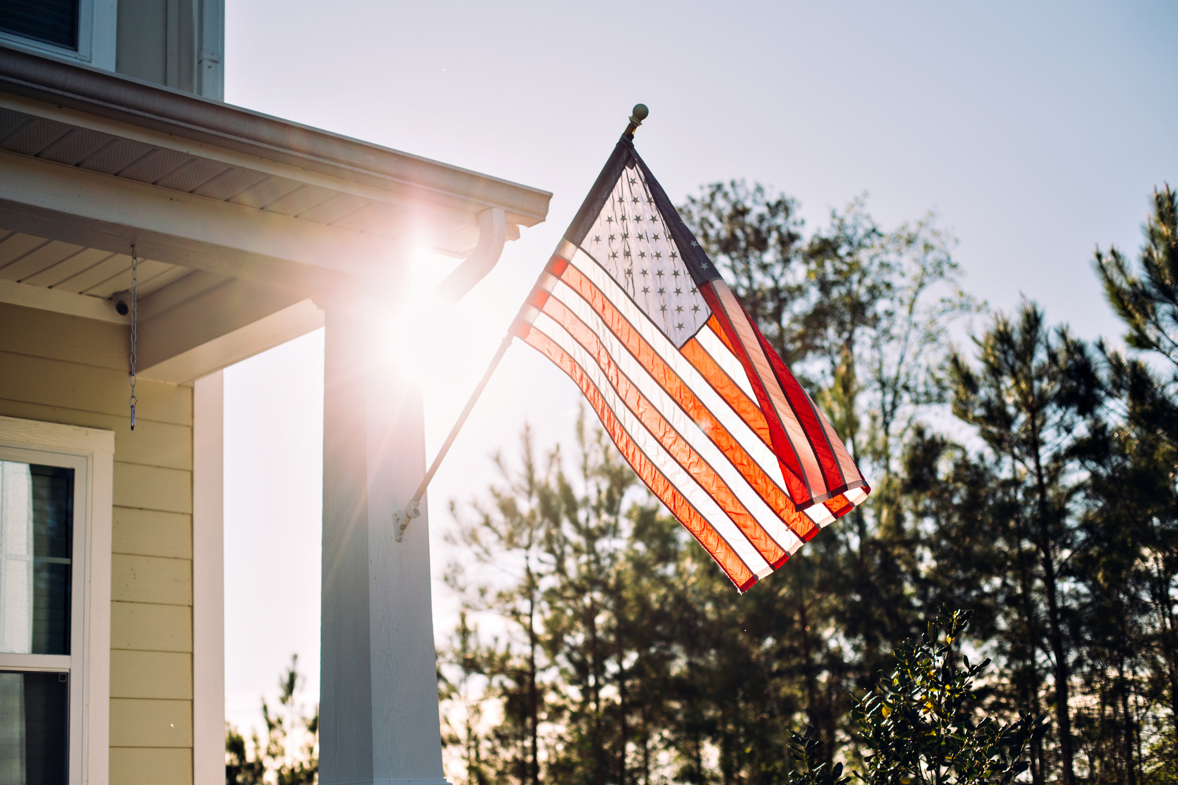 American flag in front of home
